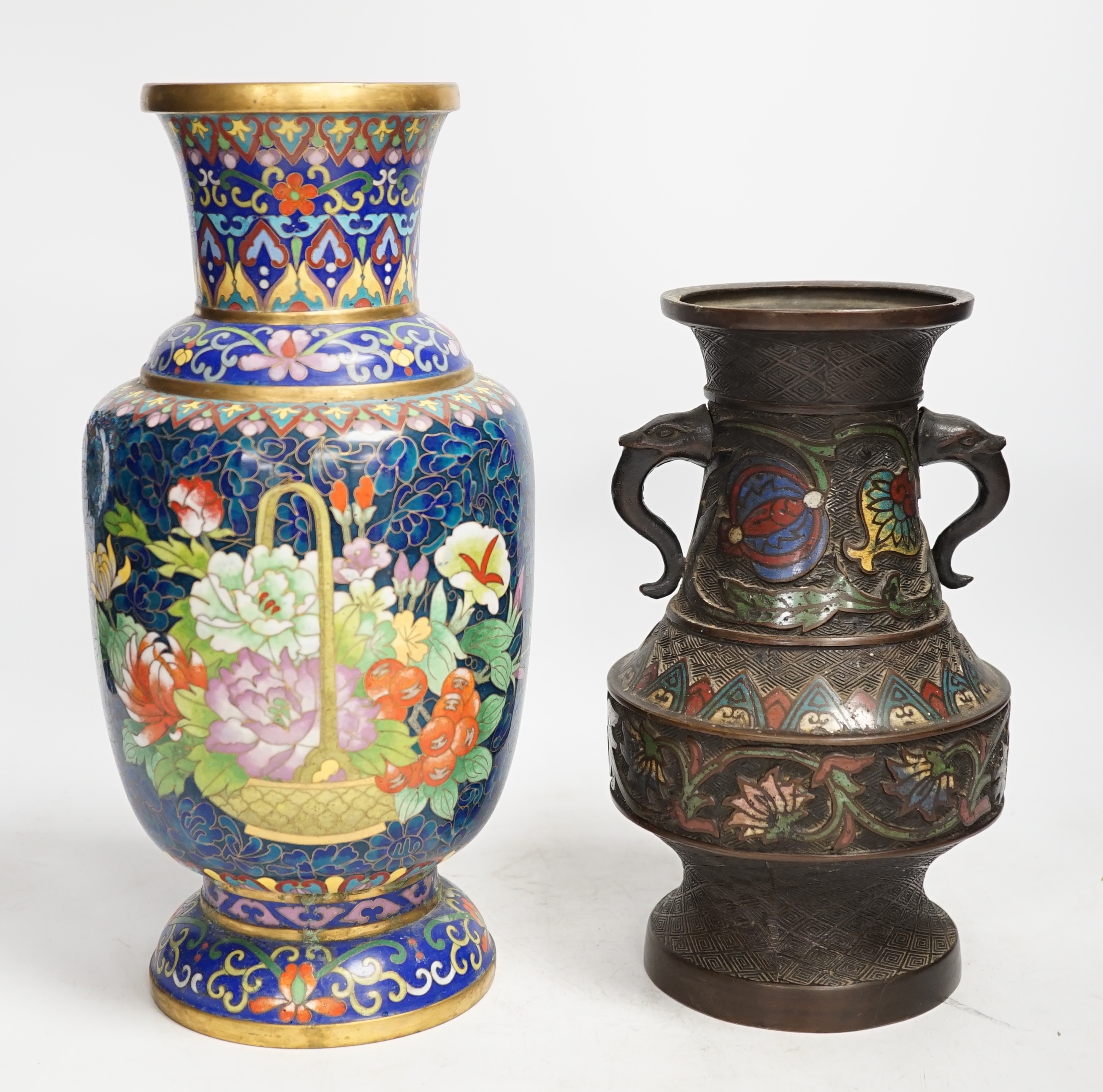 A Japanese bronze and champlevé enamel vase and a Chinese cloisonné enamel vase, Champlevé vase 24cm high. Condition - cloisonné vase dented, champlevé vase in good condition